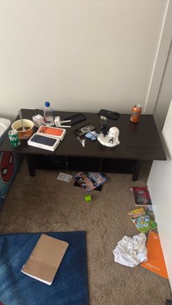 Single bed with mattress, coffee table, and bench