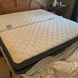 King adjustable bed with two twin extra long basis.