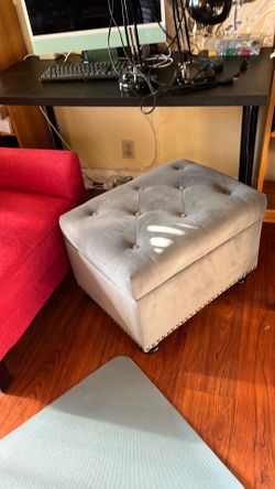Grey footstool