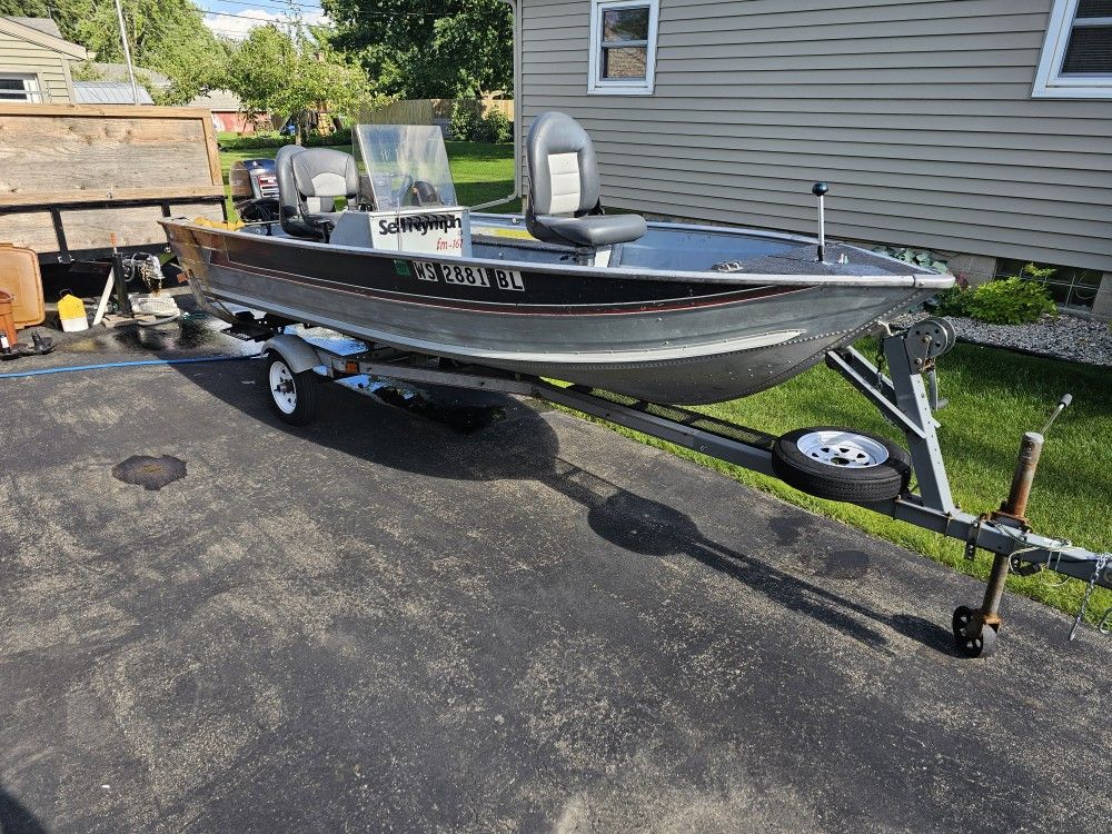 Fishing boat 1987 - 16' Sea Nymph w/ rebuilt 50 HP Mercury outboard engine.
