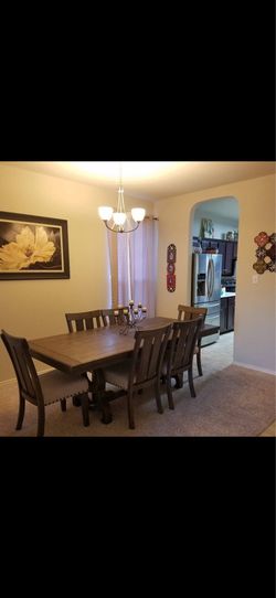 Ashley furniture dining table and 6 chairs