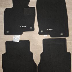 Genuine Mazda CX-5 floor mats, brand new, never used.