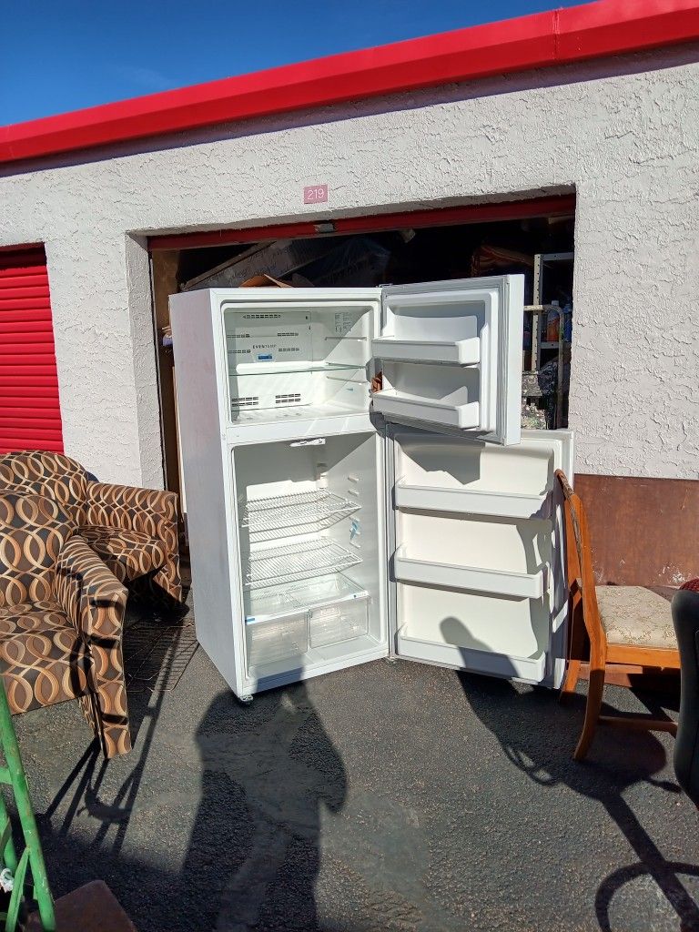 Frigidaire Upright Family 18 Cubic Foot Top Freezer Refrigerator.