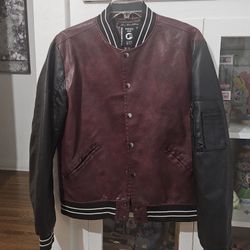 Burgundy form-fitting leather varsity jacket