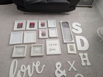 Various white wall decor... frames etc