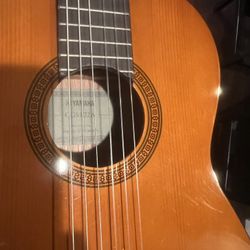 Yamaha half scale classical guitar