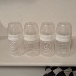 Evenflo Set Of Four Baby Bottles
