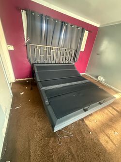 Free adjustable bed frame in great condition
