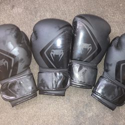 Black Venum Boxing Gloves