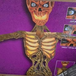 Home Accents Terrifying 12-Foot Giant Inferno Pumpkin Skeleton with LifeEyes For Halloween