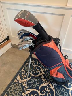 Complete set of golf clubs.