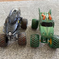 Two 1:24 Scale Monster Jam Trucks 