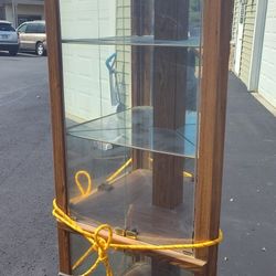 6ft Temped Oak mirrored corner curio cabinet with lights.

