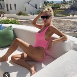 Bright neon pink swimwear by Naked Wardrobe.