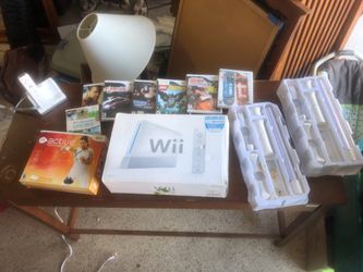 Wii with accessories, games and controllers