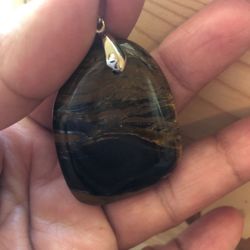 925 sterling silver bail. Tiger eye pendant