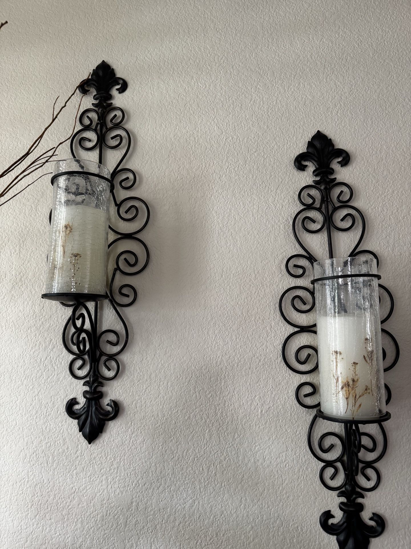Black metal set of four candle wall sconces