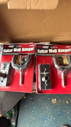 Guitar wall hangars