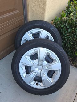 Set of 3 bridgestone ecopia HL 422 tires and wheels