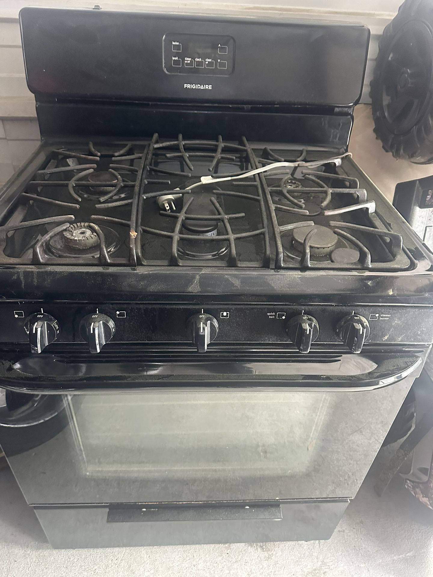 five burner gas stove and refrigerator
