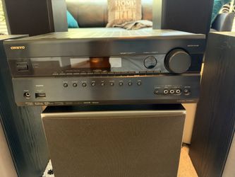 5.1 ONKYO 100 watts receiver with speaker.