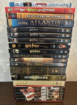 34 DVDs great condition 16 different titles kids adults