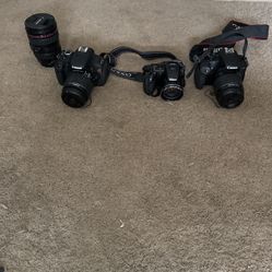 Canon and Nikon camera with starter Lens