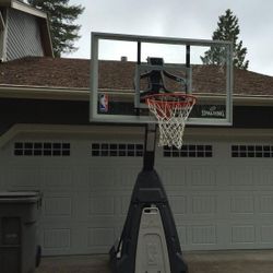 Spalding The Beast 54" Tempered Glass Portable Basketball Hoop Adjustable Basketball Court 