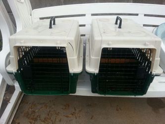 2 medium pet carriers with perch inside