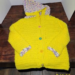Hand Crocheted Items For Infants And Young Children.
