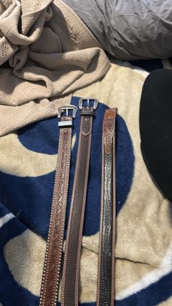 Tony Lama belts 42”