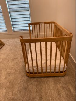 Nesting baby 3 in crib