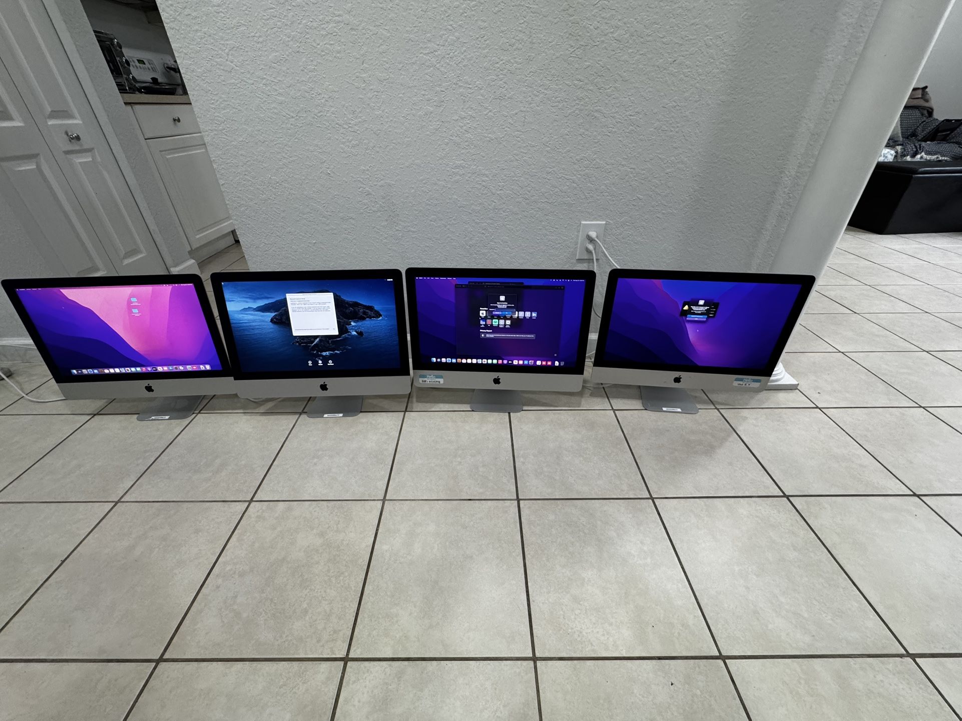 3  iMacs . Unlocked. 3 are 2015 and one 2013 . the screens have some small lines.only 3  