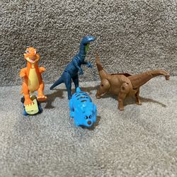 Dinosaurs lot of 4 K&M Mini Dinosaur, Easter Egg, Trex cafe on skateboard