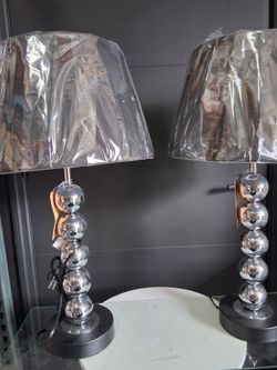 Chrome and black lamps