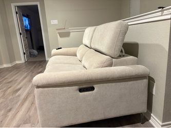 Beige reclining sofa