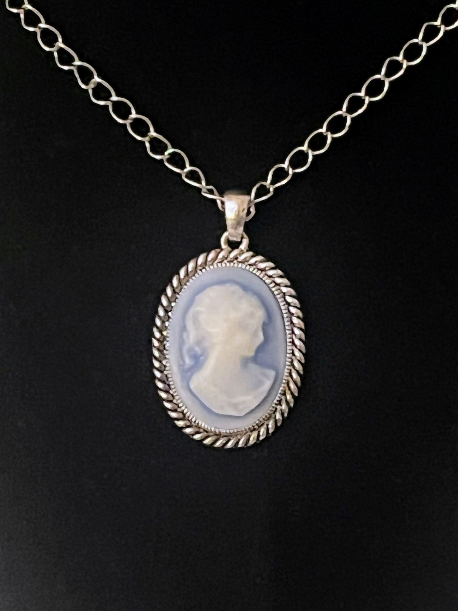 Vintage blue and white cameo necklace with silver tone chain 23” inches long chain