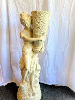 Heavy women statue. 36 inches tall.
