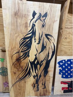 Horse mural on wood