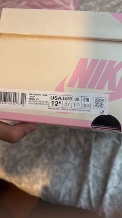 travis scott jordan 1 low tropical pink