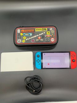 NINTENDO SWITCH W/ MARIO CASE #33842
