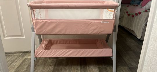 pink baby bassinet