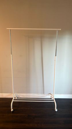 White Rolling Clothes Rack with Bottom Shelf