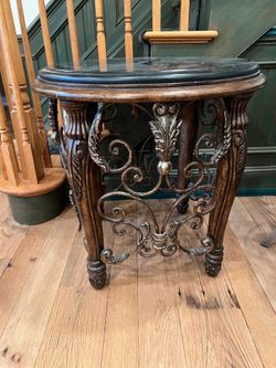 Black marble round side table