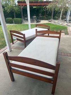 Bunk bed and mattresses $150