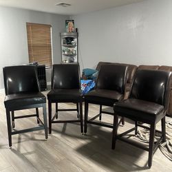 leather and wooden stools 