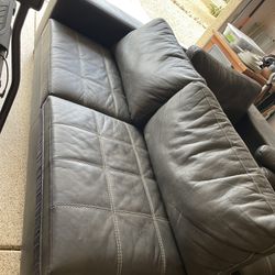 Leather Couch And Ottoman   