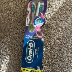 Twin Tooth Brush