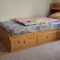  Twin size bed with storage. Mattress and sheet included. 