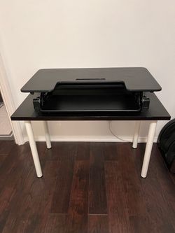 Ikea desk with adjustable table